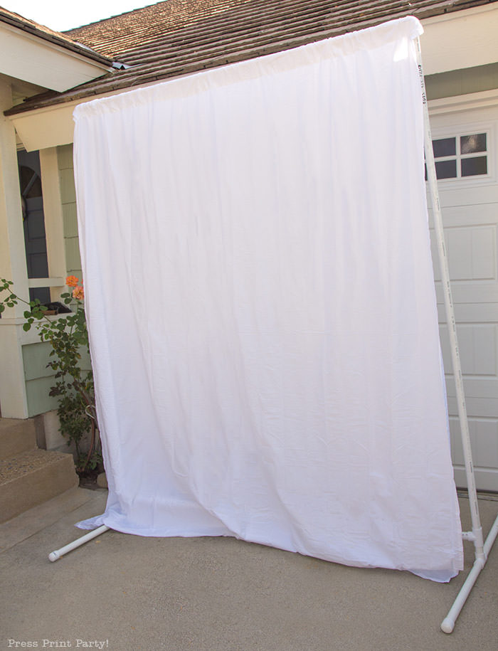 PVC Backdrop frame DIY on ground assembled with curtain- Press Print Party!
