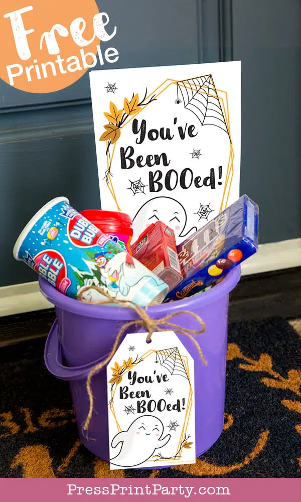 You've been booed sign and We've been booed sign halloween game with instructions Press Print Party! basket of treats at front door in bucket.