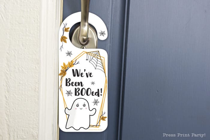 You've been booed sign and We've been booed sign halloween game with instructions Press Print Party! front door hanger