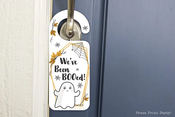 You've been booed sign and We've been booed sign halloween game with instructions Press Print Party! front door hanger