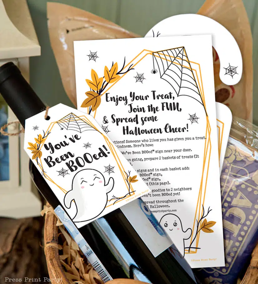 You've been booed sign and We've been booed sign halloween game with instructions Press Print Party! wine bottle in basket at front door