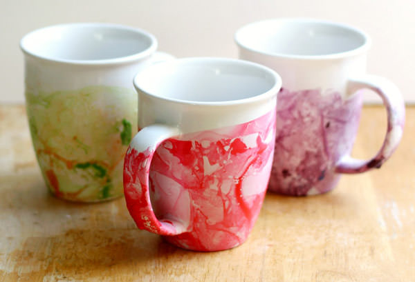 diy marbled nail polish mugs to make for mom. green, red and purple mugs