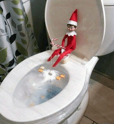 elf on the shelf ice fishing in toilet