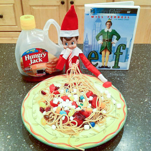 elf on the shelf eating elf spaguetti with elf movie night.