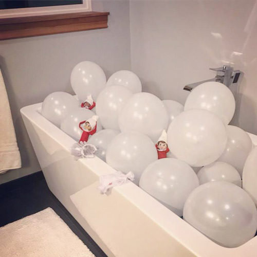 elves in bath with white balloons bubbles elf on the shelf idea