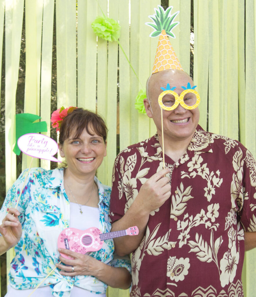 nathalie brown from Press Print Party with pineapple photo booth props