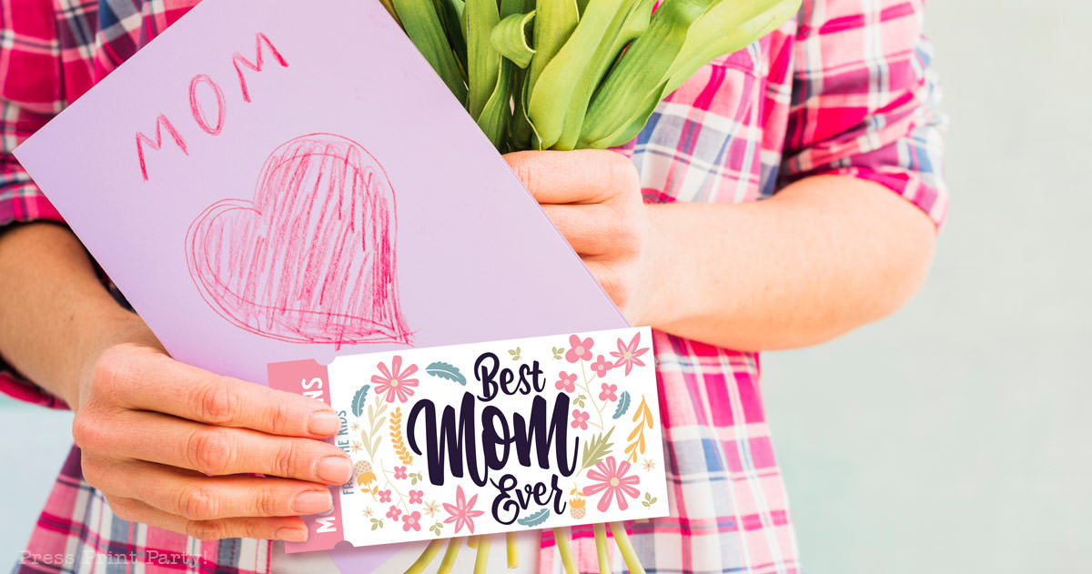 110 mother's day coupon ideas. mom holding a card and coupon book. Press Print Party!