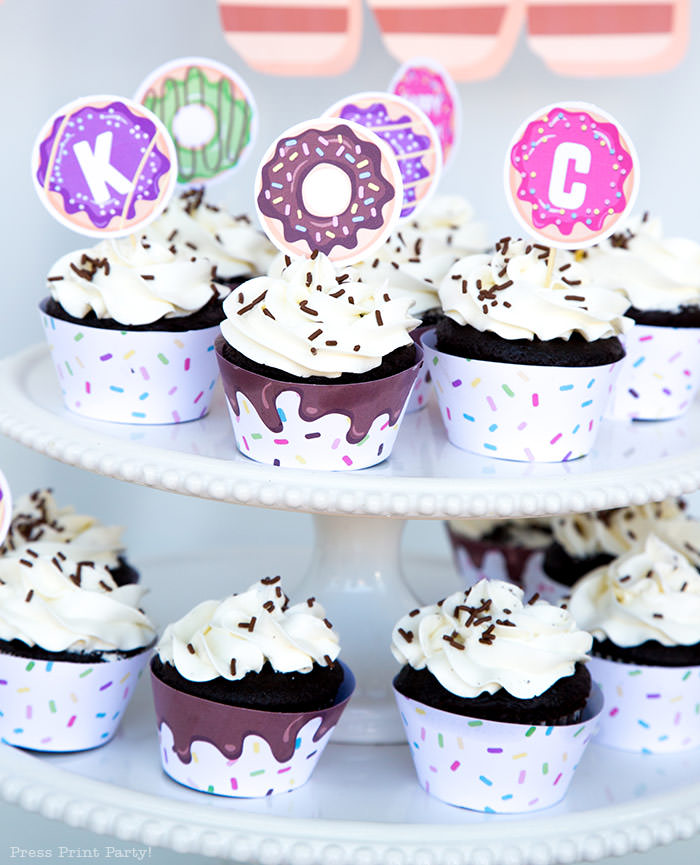 donut party ideas. cupcakes with donut cupcake wrappers and toppers with sprinkles. Press Print Party donut party supplies