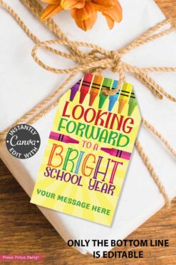 A white paper-wrapped gift with twine features the