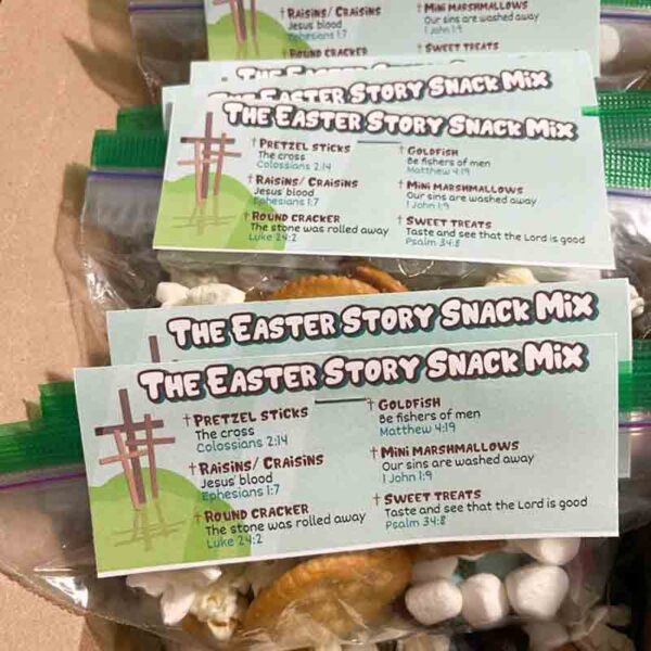 A collection of Kids Valentine chip bags labeled "I ❤ Our Friend-chip," containing pretzel sticks, raisins, crackers, Goldfish crackers, and mini marshmallows. Each label thoughtfully explains the symbolism in relation to Easter.