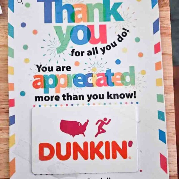 A Kids Valentine Chip Bag Tag Pink card reads, "Thank you for all you do! You are appreciated more than you know!" It features a pink Dunkin' logo gift card with a USA outline, bordered like a festive chip bag with colorful confetti.