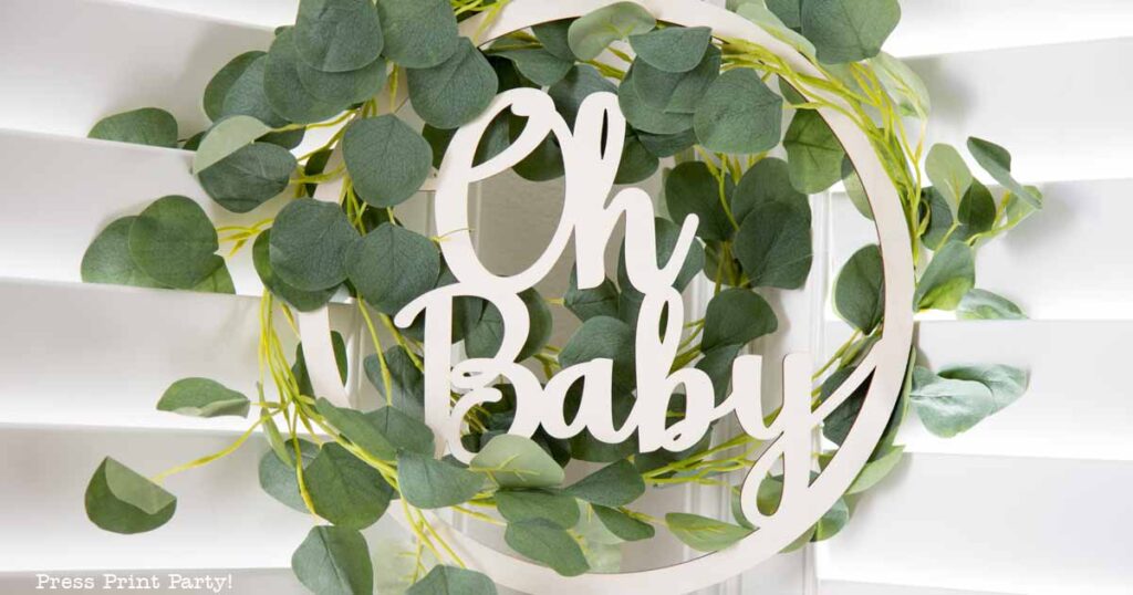 Greenery baby shower decor with eucalyptue and oh baby sign wooden - Press Print Party!