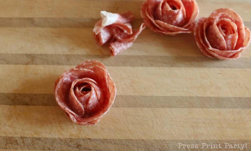 finished salami rose -how to make a salami rose for your charcuterie board - Press Print Party
