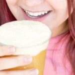 the best party recipe for summer punch with 3 ingredients easy amazing punch- summer punch recipe-.girl drinking tropical punch with ice cream float.10 Easy Punch Recipes for Parties, Non-Alcoholic Summer Drinks - Press Print Party