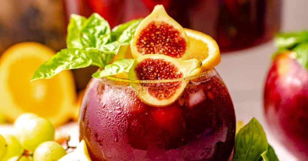 bourbon sangria - 35 Great Christmas Punch Recipes to Make for a Crowd Press Print Party