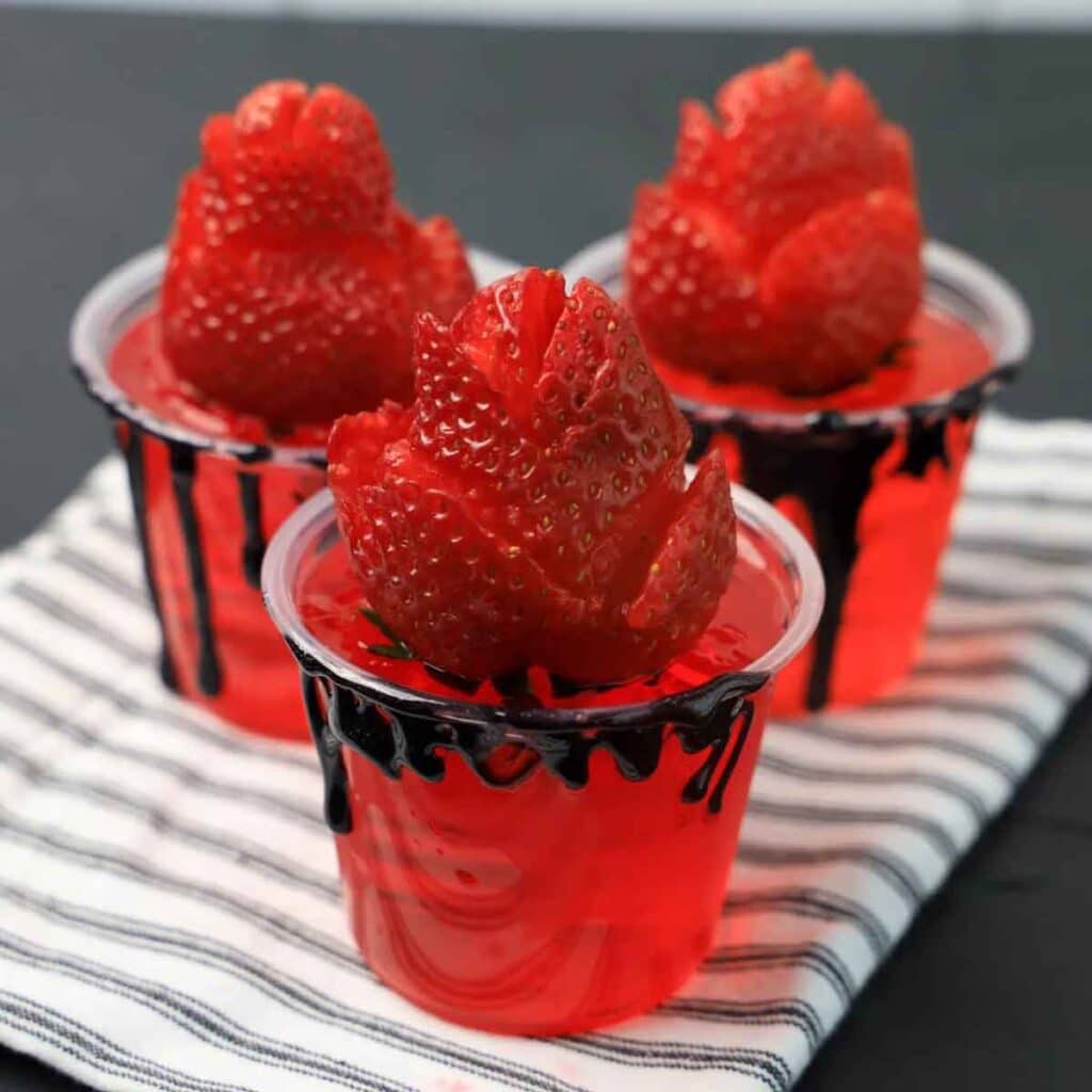 red halloween jello shot- 33 Wickedly Fun Recipes for Halloween Drinks ideas non alcoholic for Kids & alcoholic for Adults - Press Print Party