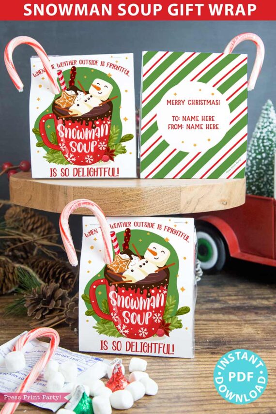 snowman soup printable kit wrap, snowman soup gift bag topper, snowman soup recipe with chocolate mix, candy cane and kisses. When the weather outside is frightful, snowman soup is so delightful. Press Print Party.