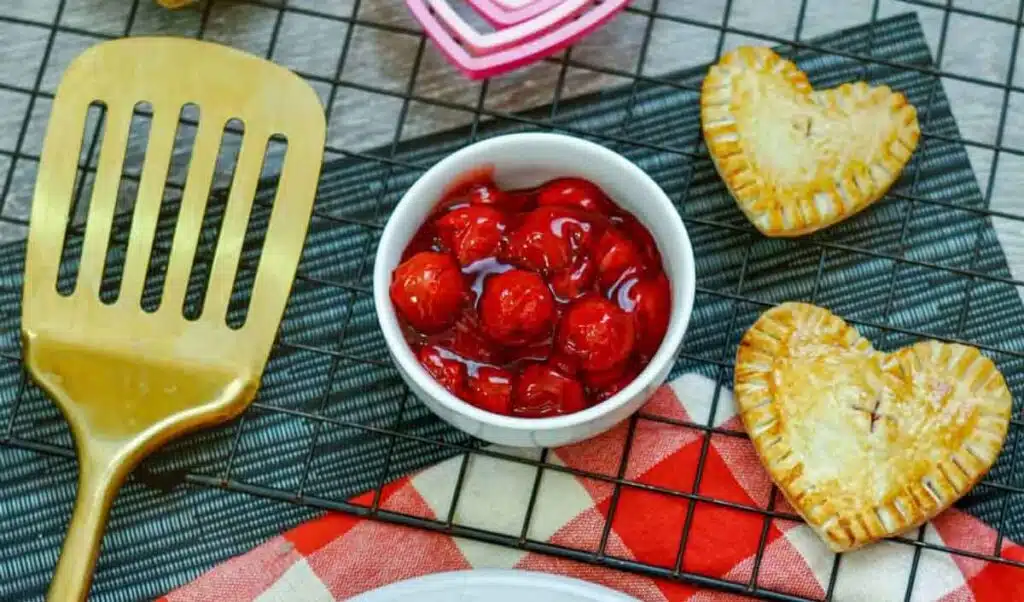 air fryer cherry pies in heart shape - Valentine Snack Ideas for Classroom parties at school - Press Print Party!