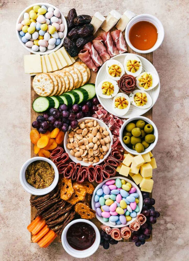 charcuterie board with easter candy - Beautiful Easter Charcuterie Board Ideas - Press Print Party