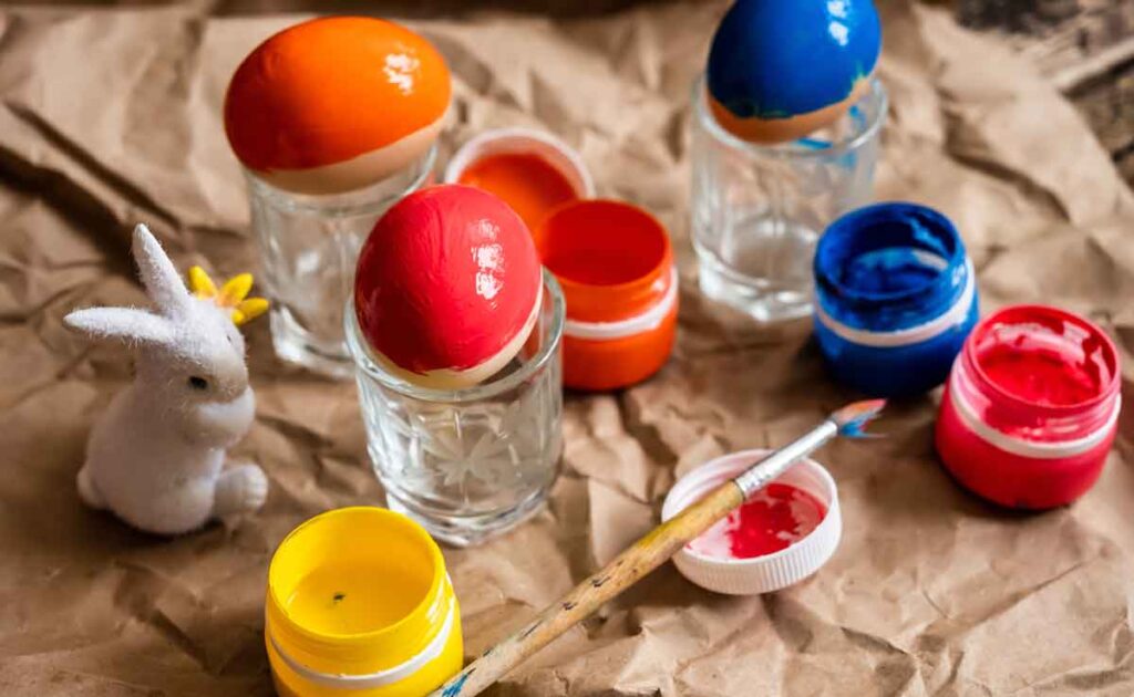 Painting easter eggs- 13 Creative Ideas for Coloring Easter Eggs with the Kids- Press Print Party!