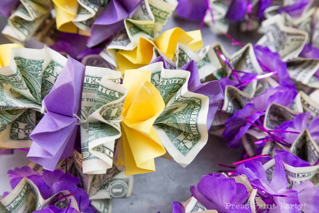 How to Make a Money Graduation Lei Two Easy Ways - how to make graduation lei with money from a dollar store lei and with construction paper and ribbon - Press Print Party!