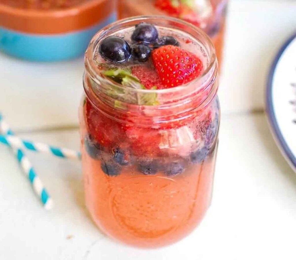 strawberry blueberry lemonade spritzer - 75 Red White and Blue Food Ideas and Patriotic Recipes for fourth of July, memorial day. Press Print Party!