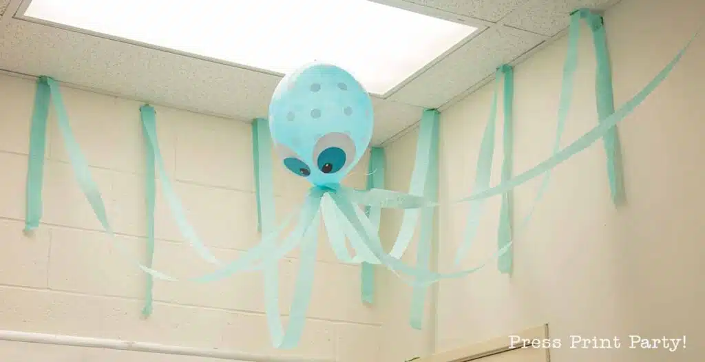 balloon octopus on the ceiling for under the sea decorations. Press Print Party!