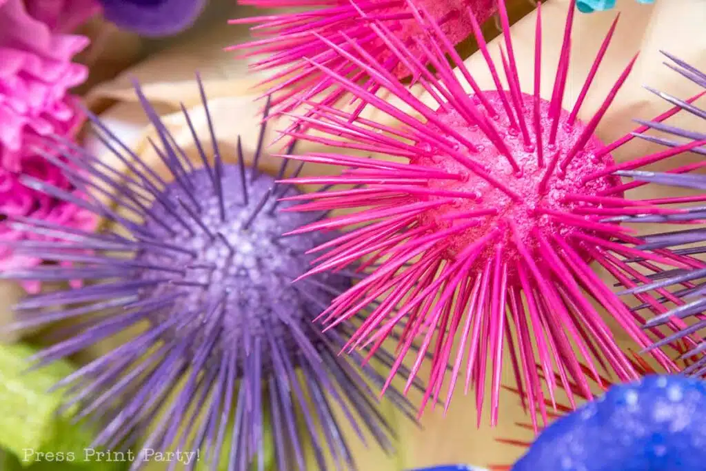 fake coral made from foam balls and tooth picks painted pink and purple