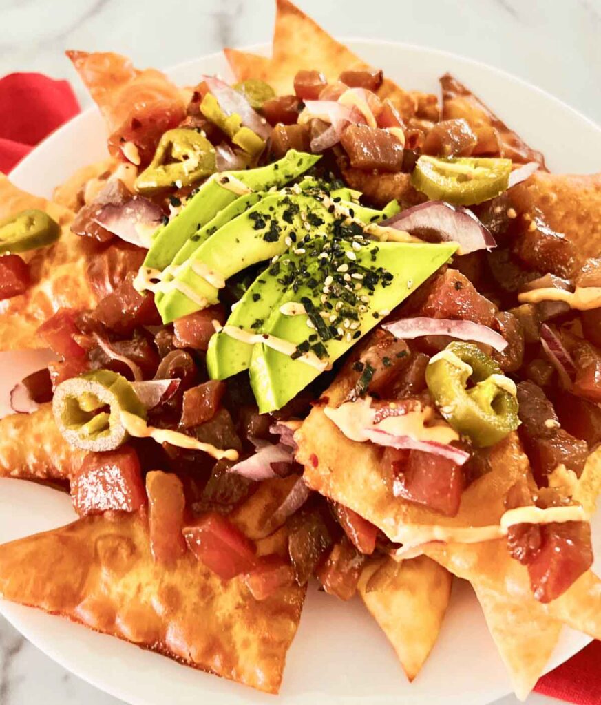 ahi tuna poke nachos - 25 Yummy Hawaiian luau party foods for your next backyard bash - tropical foods and recipes - Press Print Party!