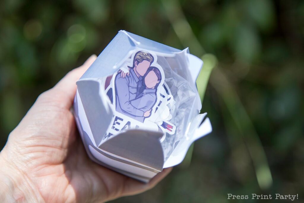 Hunger Games Parachute Container favor box party decorations tutorial with balloon for Hunger Games party decorations. with hunger games stickers inside- Press Print Party!