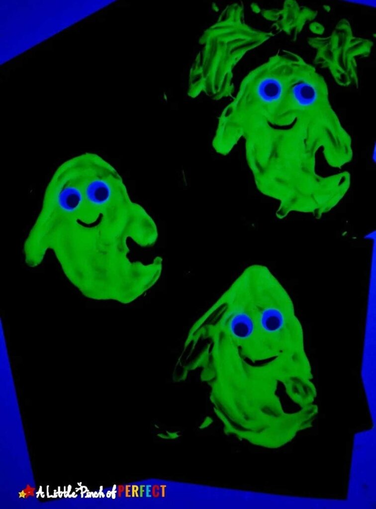 glow in the dark ghosts painting - 19 Festive and easy Halloween crafts for kids - Press Print Party!