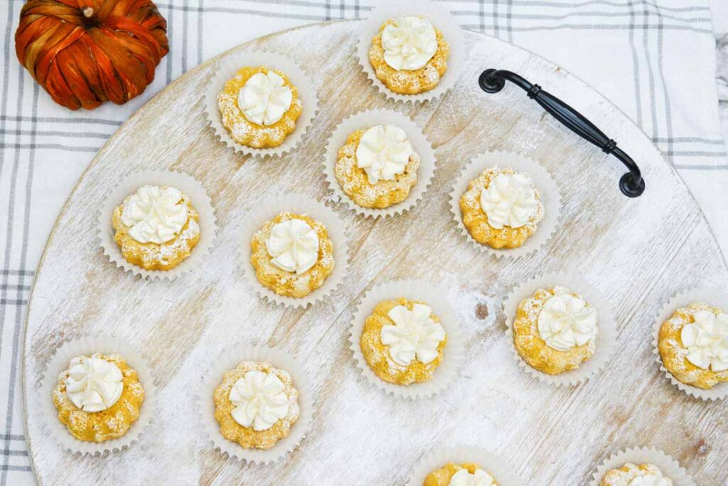 Best mini pumpkin bundt cake with cream cheese frosting recipe with powered sugar, delicious perfect fall dessert - Press Print Party!