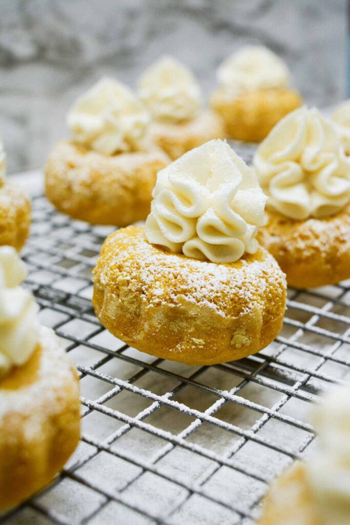 Best mini pumpkin bundt cake with cream cheese frosting recipe with powered sugar, delicious perfect fall dessert - Press Print Party!