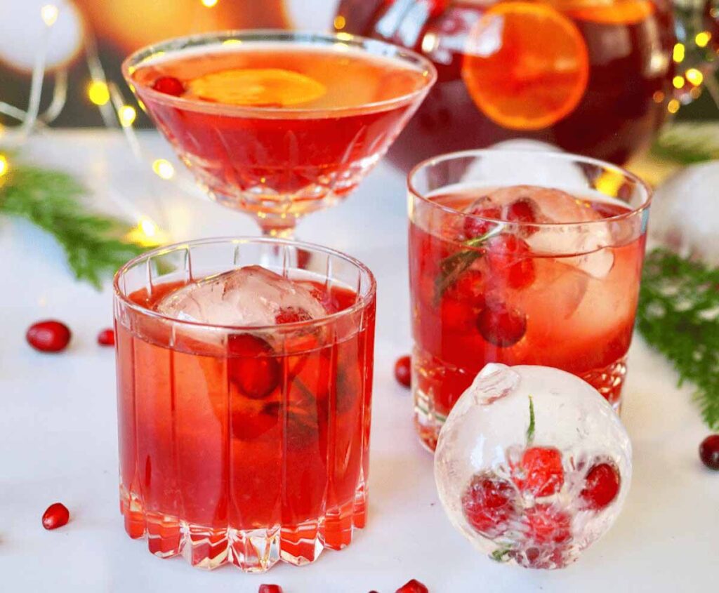 pomegranate vodka punch square- Tasty Thanksgiving punch recipe non-alcoholic and alcoholic to feed a crowd. Press Print Party