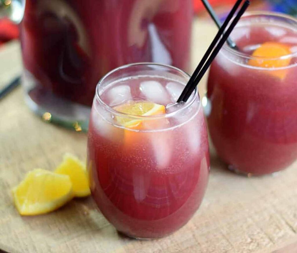 pomegranate orange holiday punch - Tasty Thanksgiving punch recipe non-alcoholic and alcoholic to feed a crowd. Press Print Party