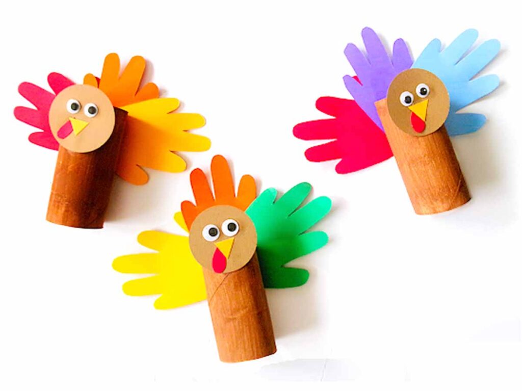 cardboard roll hand print turkey craft - 45 Turkey crafts ideas for kids - Press Print Party!