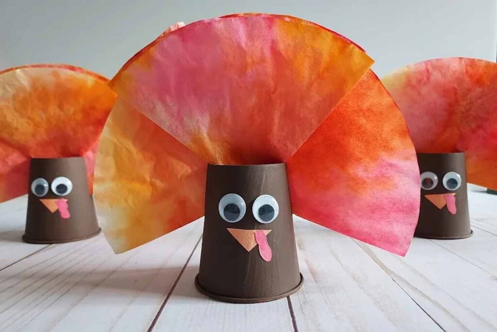 Paper cup turkey craft with coffee filters - 45 Turkey crafts ideas for kids - Press Print Party!