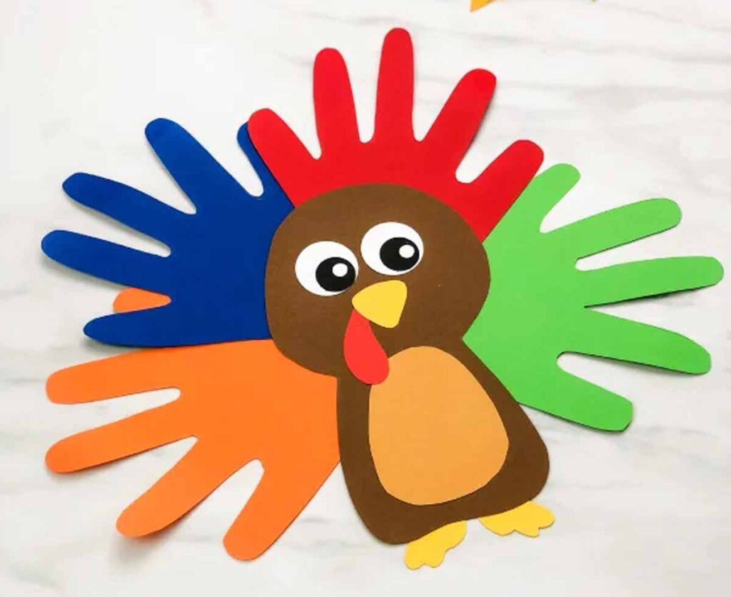 hand print outline turkey craft - 45 Turkey crafts ideas for kids - Press Print Party!