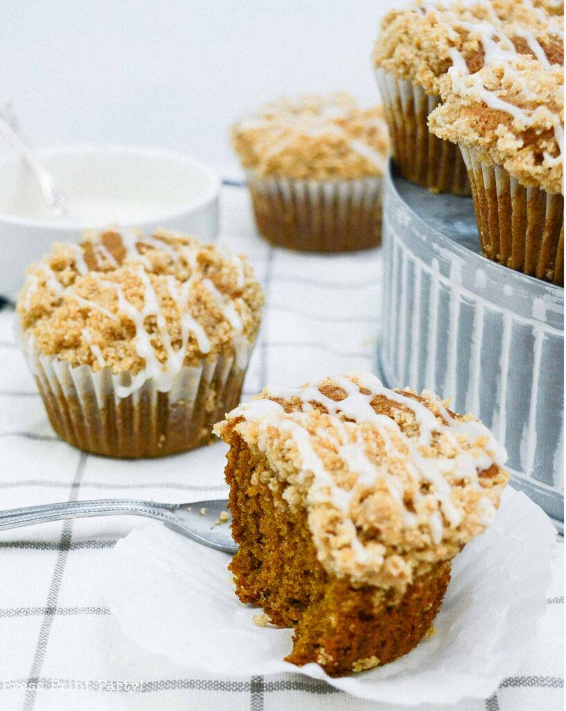 pumpkin streusel muffins recipe with vanilla glaze. A great fall treat for thanksgiving dessert - Press Print Party!