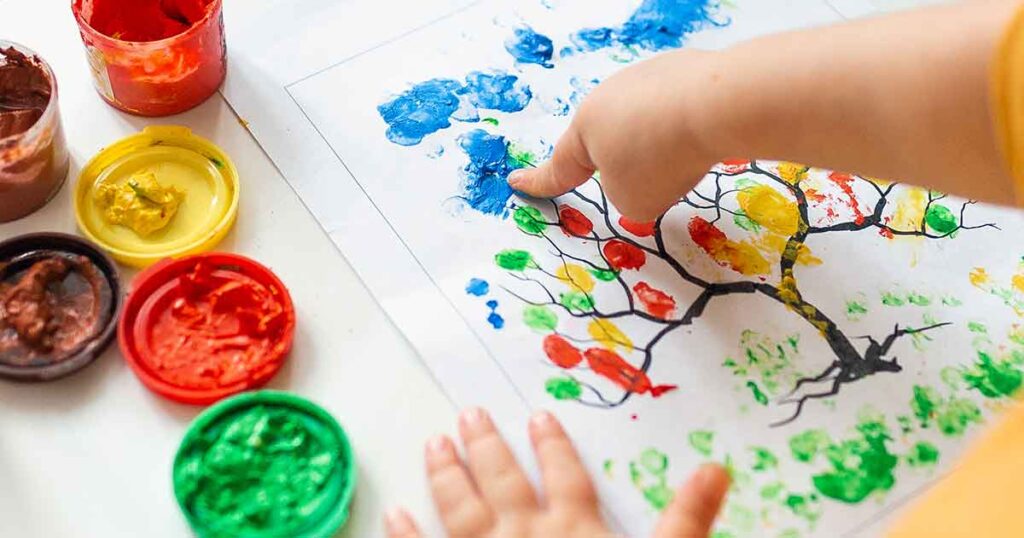 toddler finger painting - 15 fun birthday party activities for toddlers and young kids - Press Print Party!