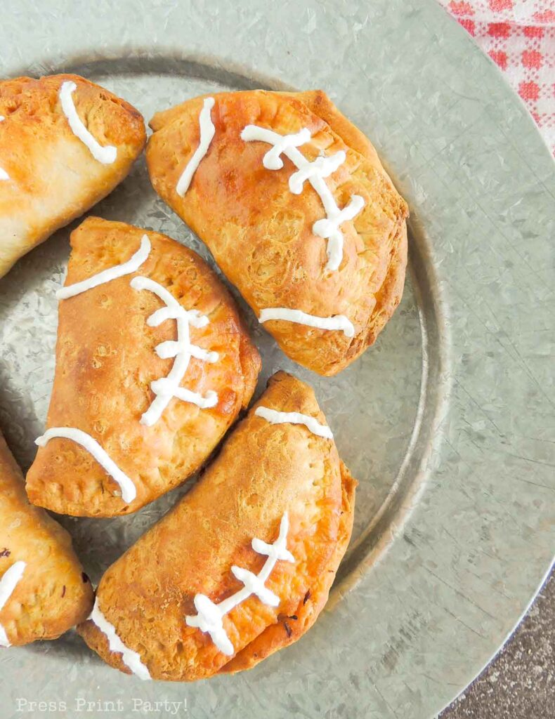 Tasty pulled buffalo chicken football hand pies - Press Print Party!