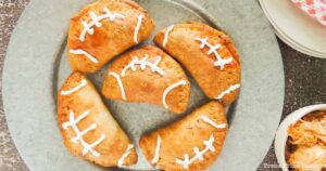 Tasty pulled buffalo chicken football hand pies - Press Print Party!