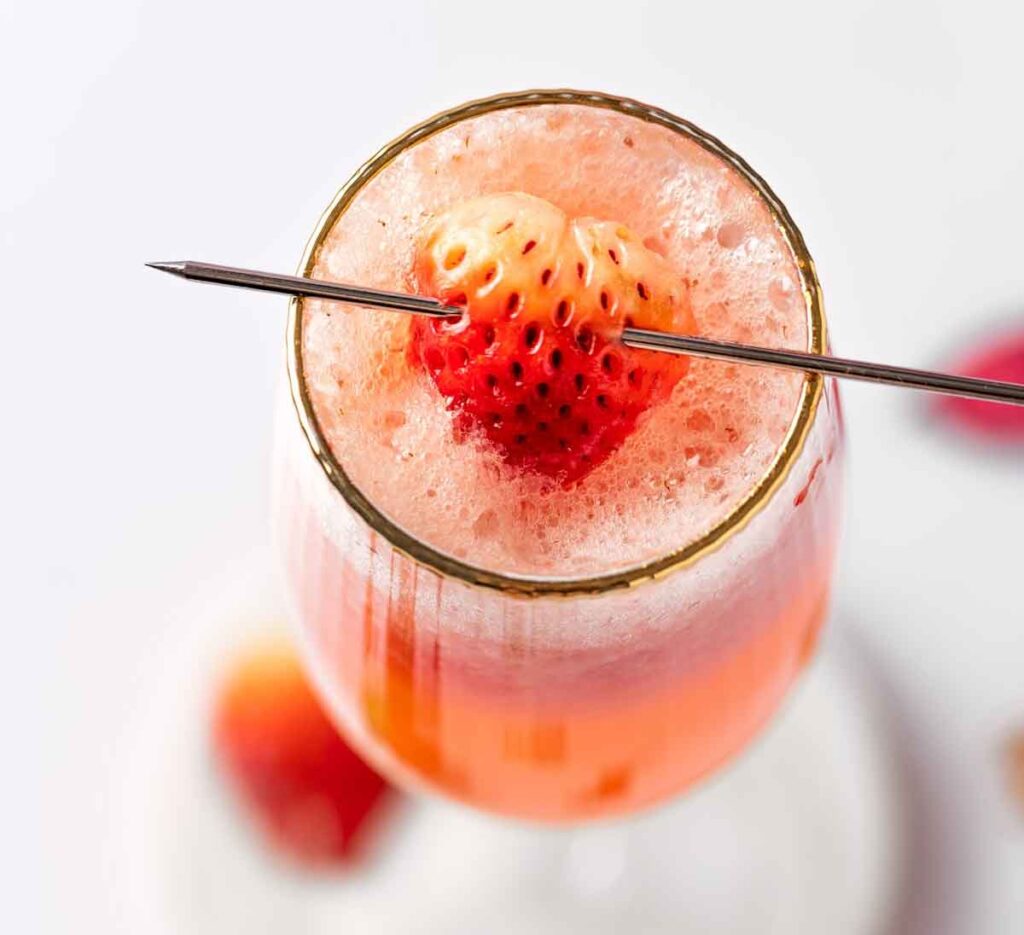 strawberry bellini- 30 romantic valentine's day drinks to set the mood - Press Print Party