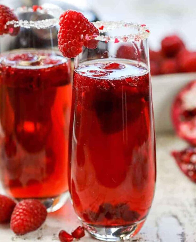 Raspberry mimosa mocktail- 30 romantic valentine's day drinks to set the mood - Press Print Party