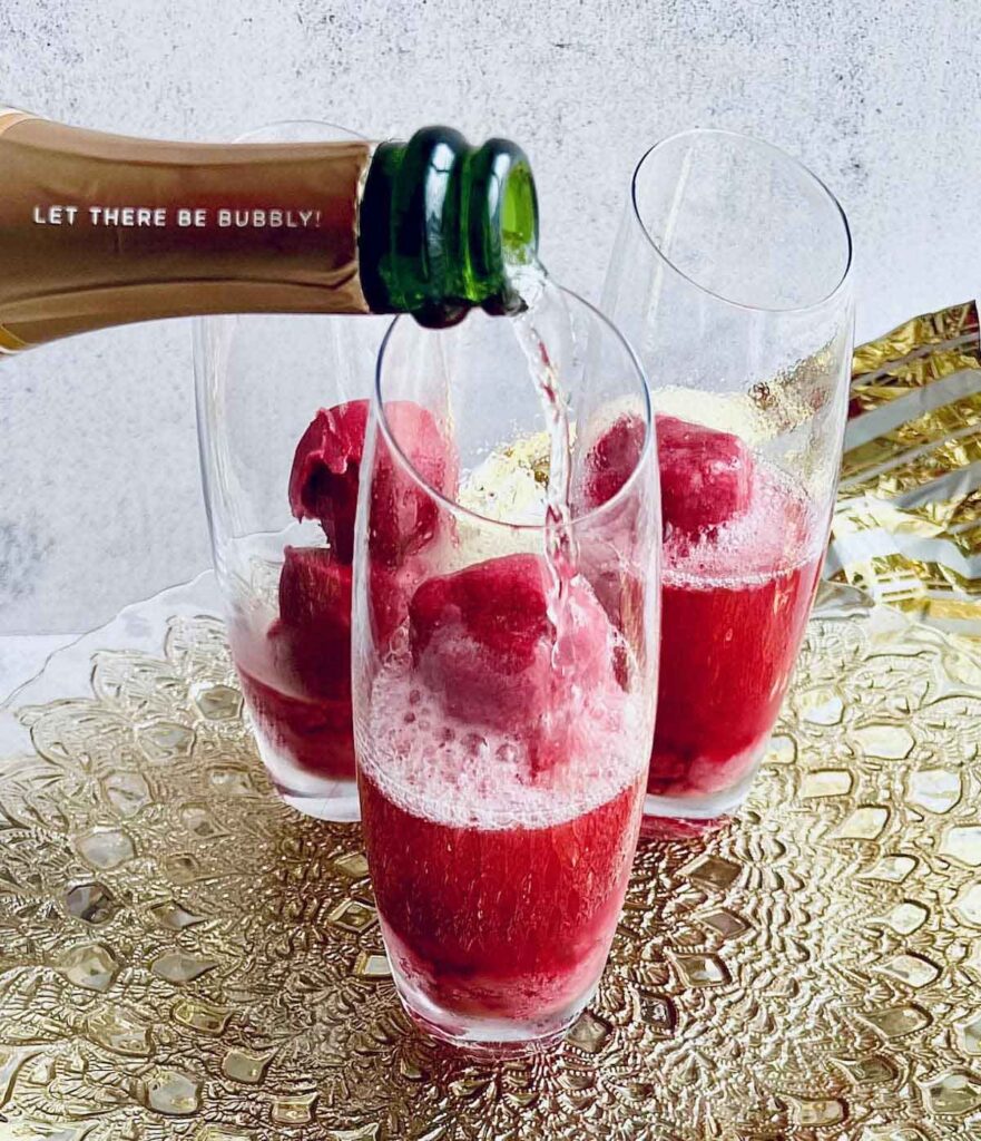 raspberry mimosa with sorbet - 30 romantic valentine's day drinks to set the mood - Press Print Party