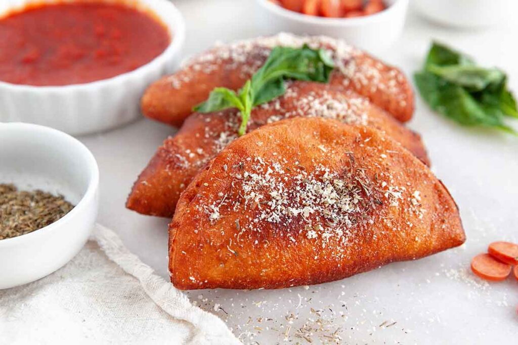 Mini Pizza Calzones by Noshing with the Nolands - Easy Football Finger Foods for Your Game Day Party - Press Print Party!