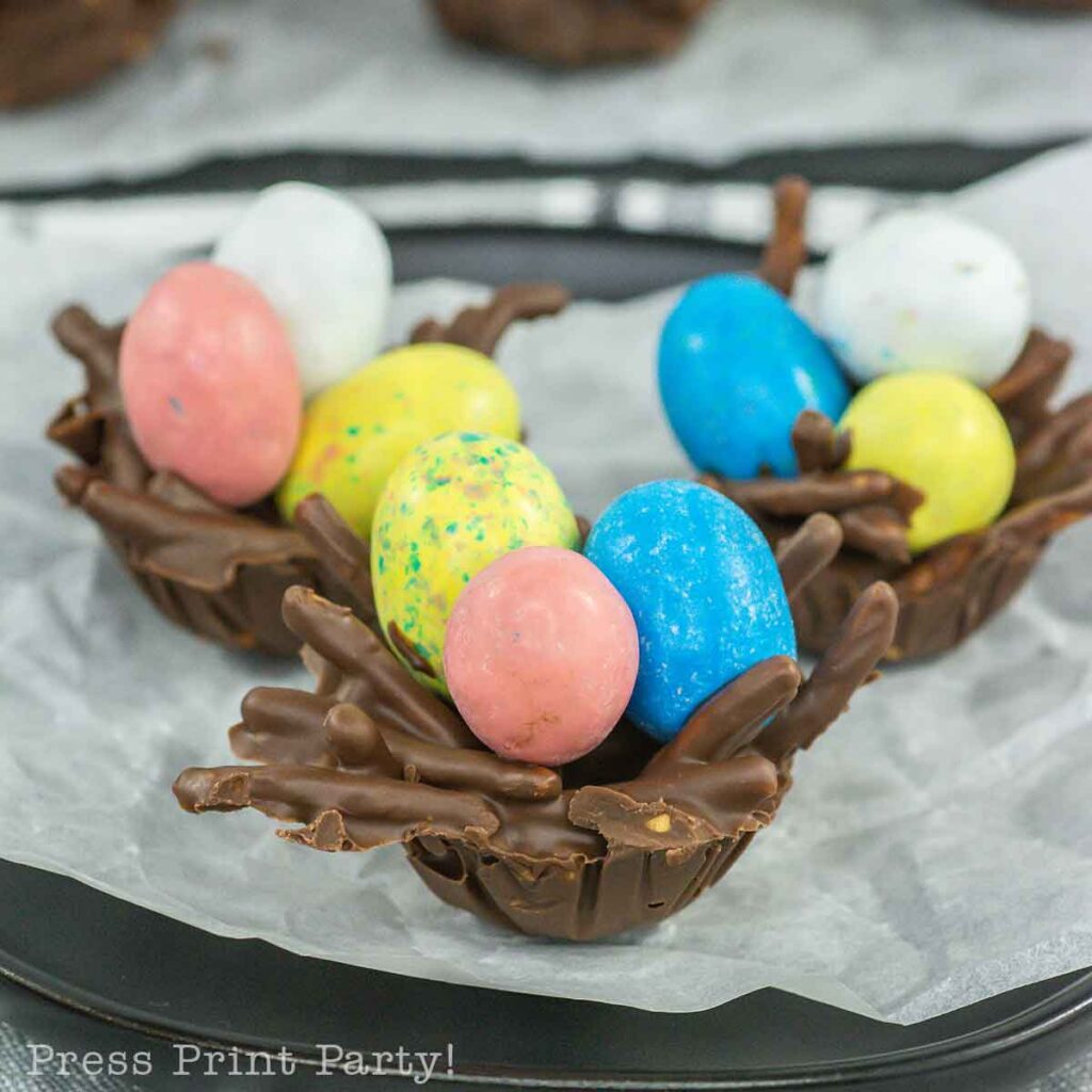 bird's nest cookies for easter with chocolate, peanut butter, pretzel or chow mein noodles and egg candies. no bake Press Print Party!