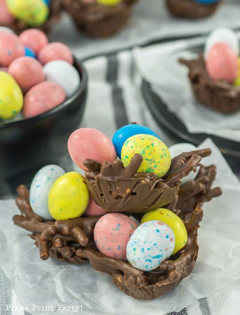 bird's nest cookies for easter with chocolate, peanut butter, pretzel or chow mein noodles and egg candies. no bake Press Print Party!