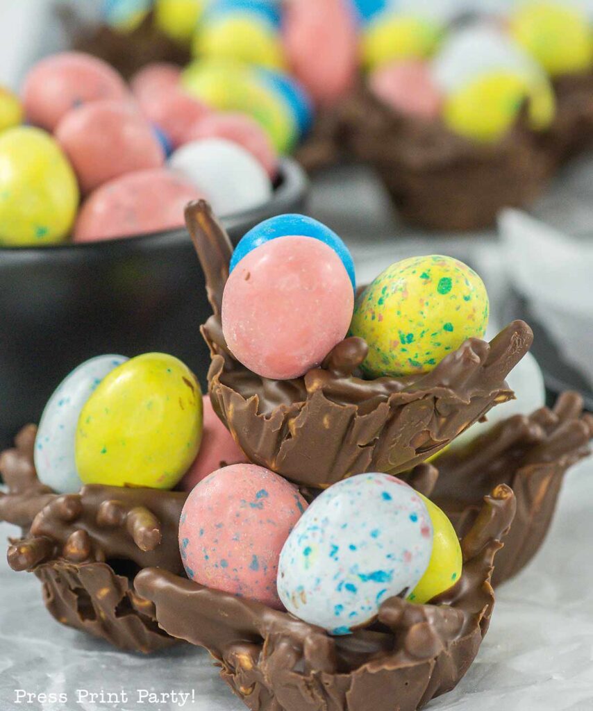 bird's nest cookies for easter with chocolate, peanut butter, pretzel or chow mein noodles and egg candies. no bake Press Print Party!