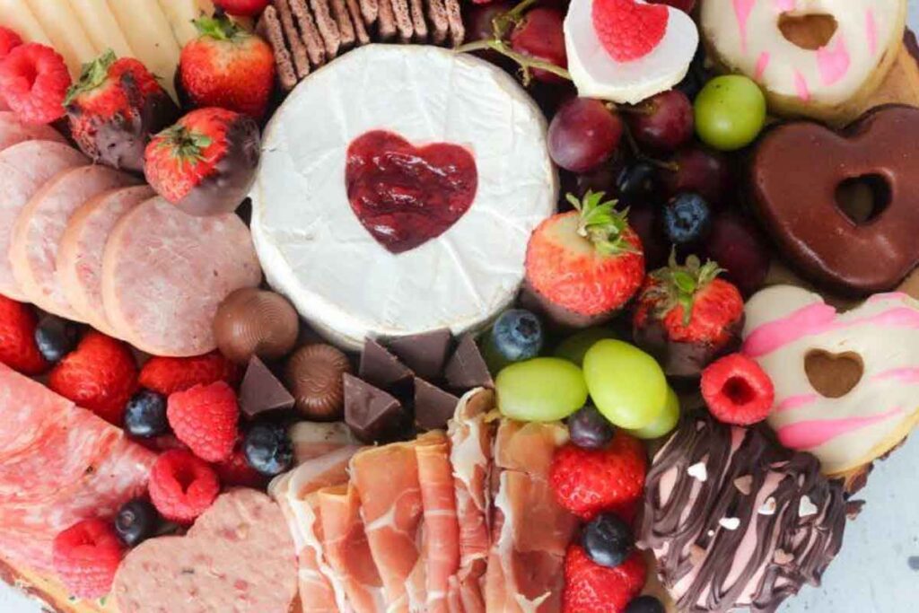 Heart-y Valentine’s Day Charcuterie Board by Unique Gifter - 20 Valentine Charcuterie Boards: Ideas and Inspiration